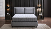 Letto a molle con materasso a molle “Ergocoil Infinity Pro” per chi dorme sulla schiena e sul fianco